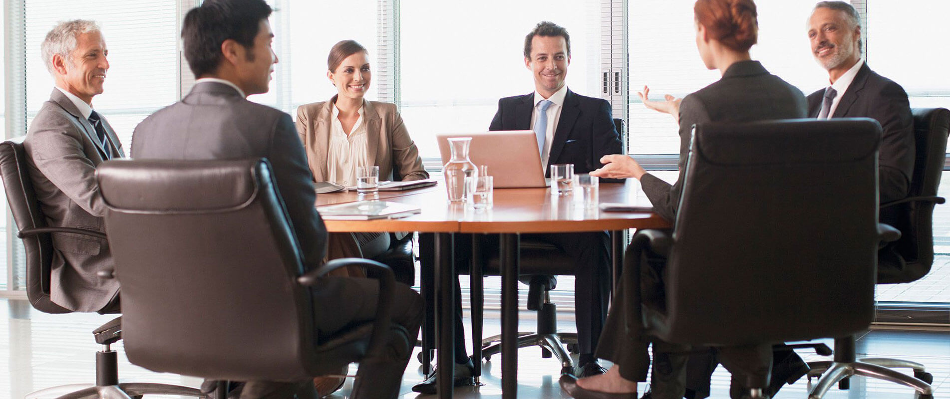A company meeting at a board table